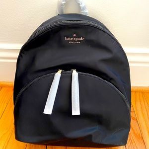Black Kate Spade 3-compartment backpack. Brand new with tags. Originally $299
